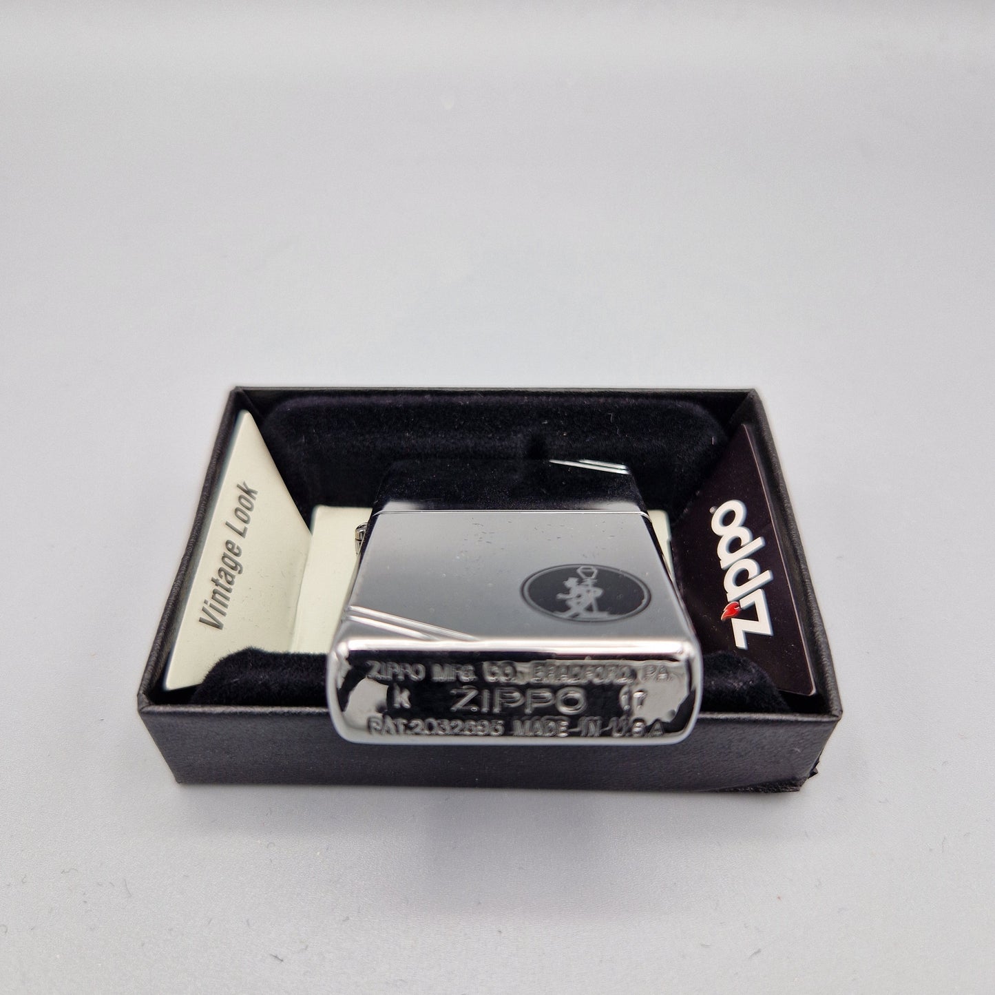 Zippo Feuerzeug 60003886	Reveler	K17	Lighter - ungezündet