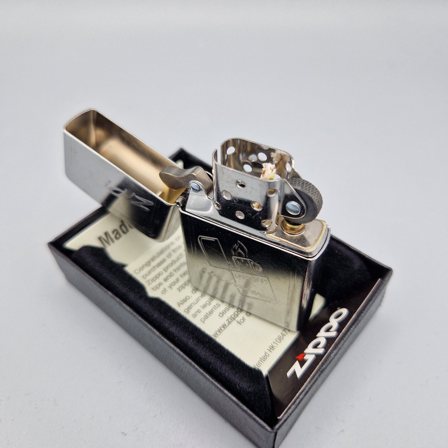 Zippo Feuerzeug 60004339	25th Anniversary	D18	Lighter - ungezündet