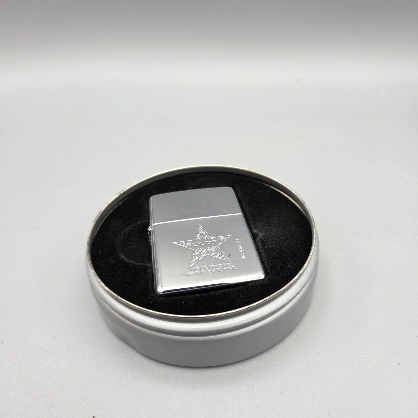 Zippo Hollywood Star	K XVI (2000)	Feuerzeug	Lighter - ungezündet