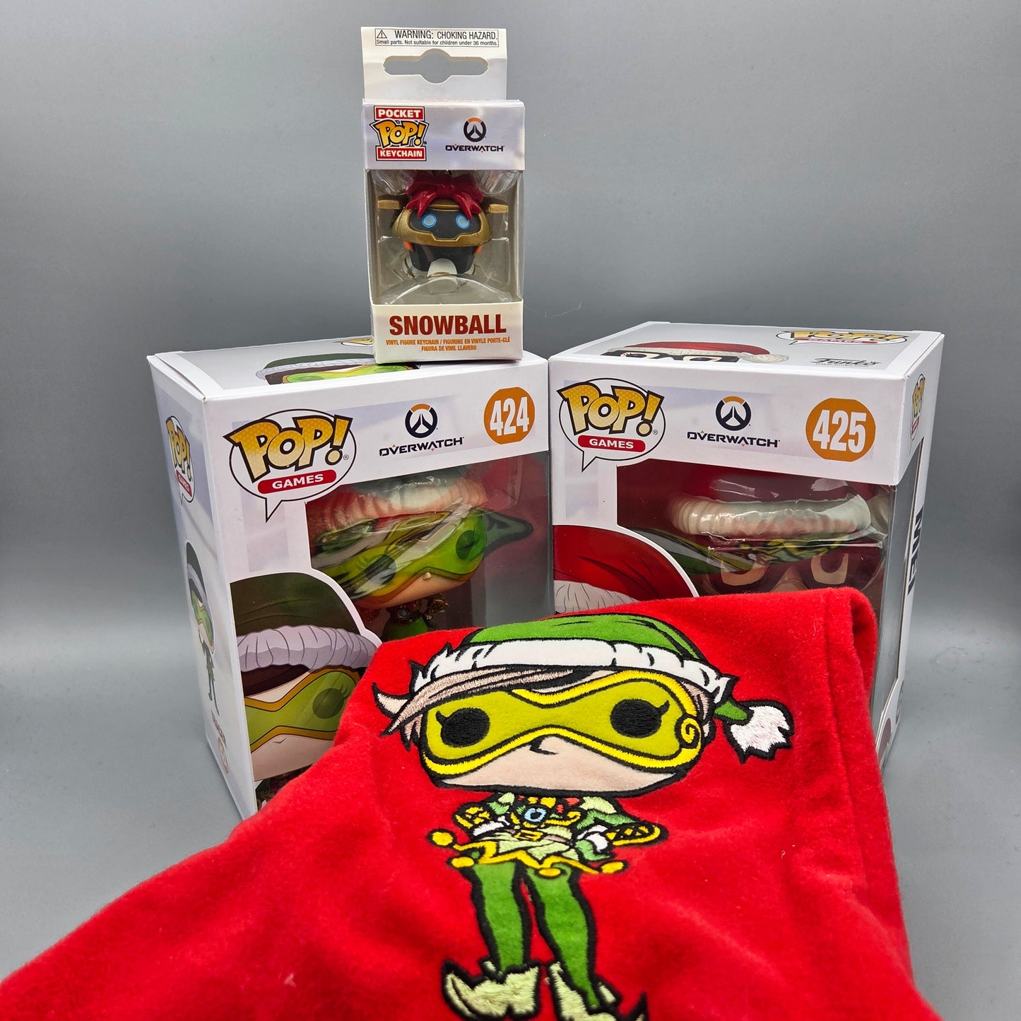 Funko Pop! Overwatch Christmas Sammlerbox Tracer & Mei	inkl. Roter Weihnachtssocke und Keychain