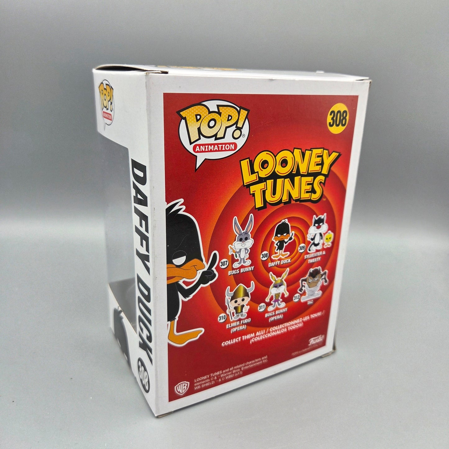 Funko Pop! Looney Tunes	#308 Daffy Duck		Animation	Vinylfigur