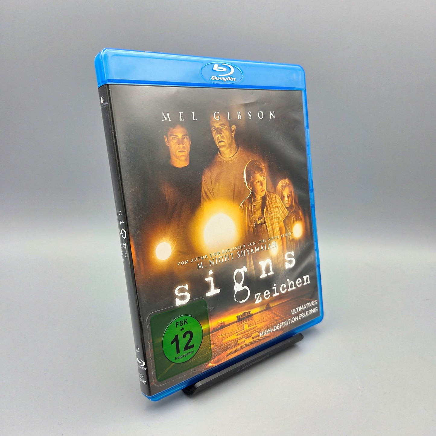 Signs		Blu-Ray Film	mit Mel Gibson