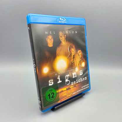 Signs		Blu-Ray Film	mit Mel Gibson