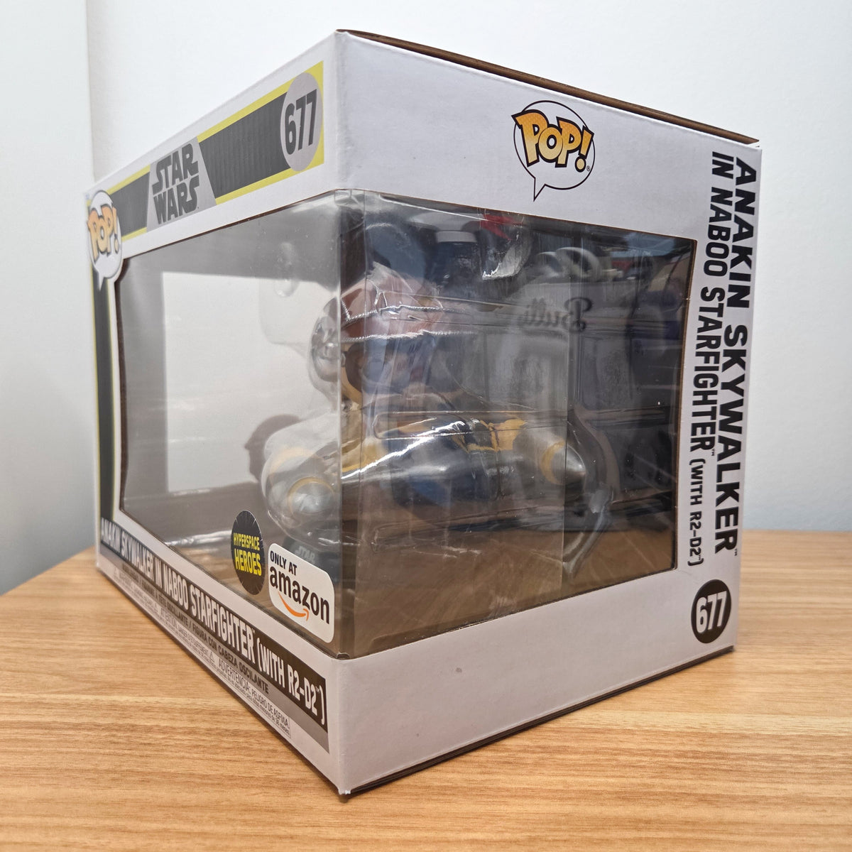 Funko Pop! Star Wars #677 Anakin Skywalker in Naboo Starfighter (with R2-D2)		-	Vinylfigur