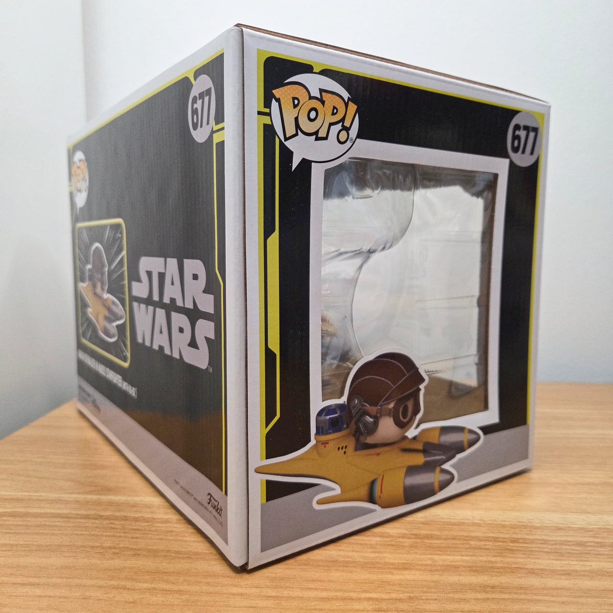Funko Pop! Star Wars #677 Anakin Skywalker in Naboo Starfighter (with R2-D2)		-	Vinylfigur